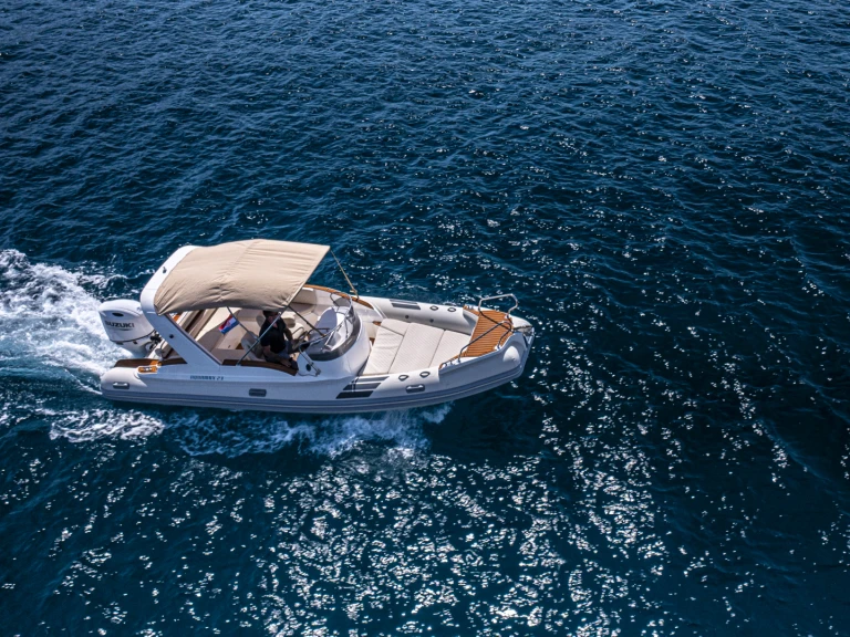 Aquamax B 23 F charter bareboat or captained in  Hvar