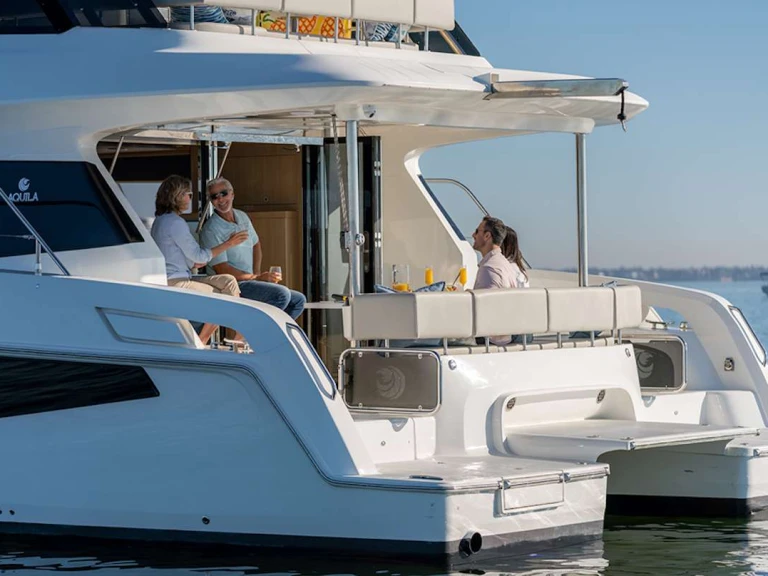 Aquila Big Joy charter bareboat or captained in  Cannigione