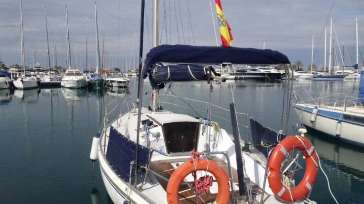 Jeanneau Aquila charter bareboat or captained in  La Manga
