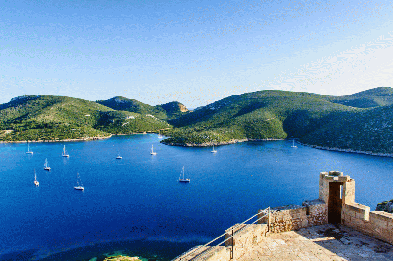 Cabrera Bay with sailboats at anchor